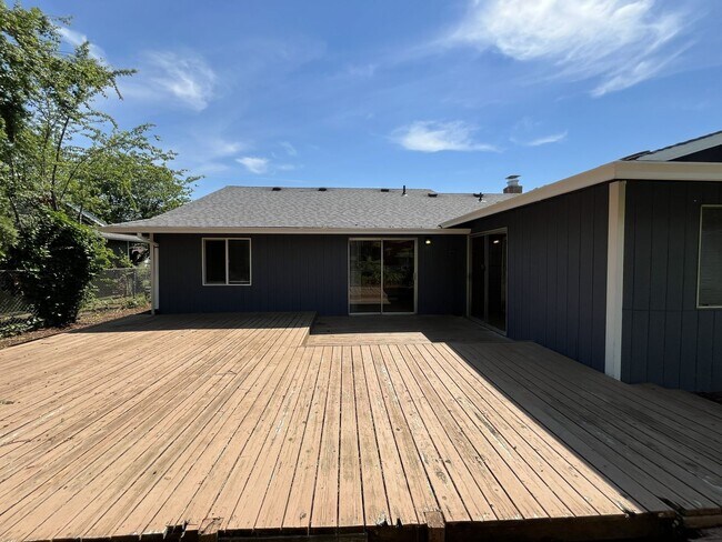 Building Photo - Charming Ranch Home with Sunroom or 4th Bedroom, Two-Car Garage and Fenced Backyard