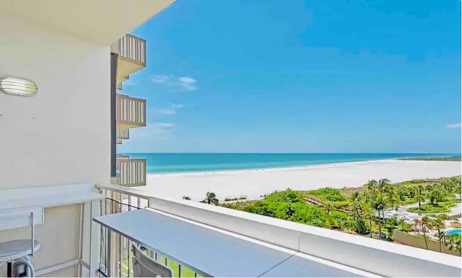 View of beach from balcony - 58 N Collier Blvd