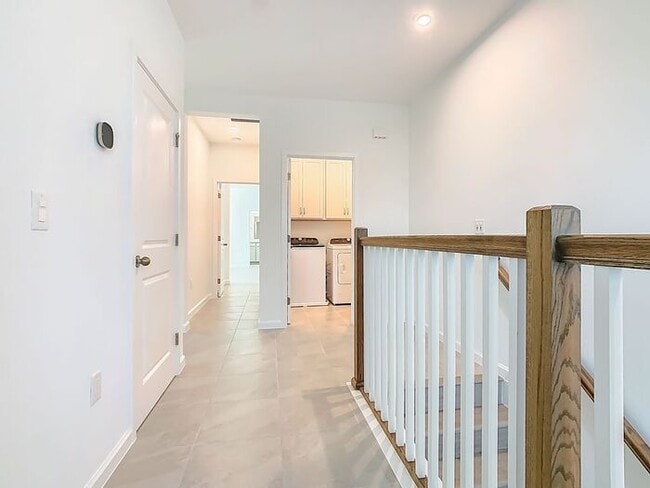 Building Photo - New Luxury Townhome in Celebration with All porcelain tiled floors. Island Village new construction