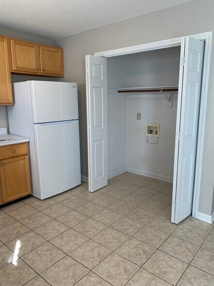 Laundry hook up in kitchen closet. - 5516 Bellcamp Ct