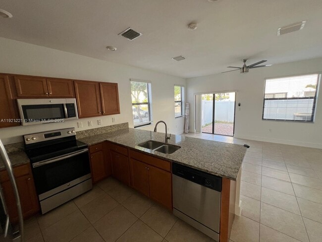 Building Photo - 9399 W 33rd Ln