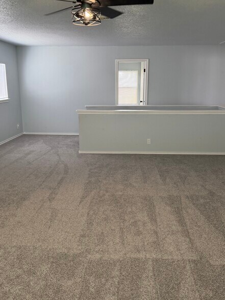 Family/Game room facing stairs - 9647 Orchid Mdws