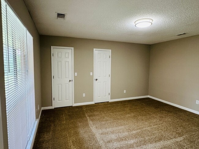 Building Photo - Your new home is just a putt away with thi...