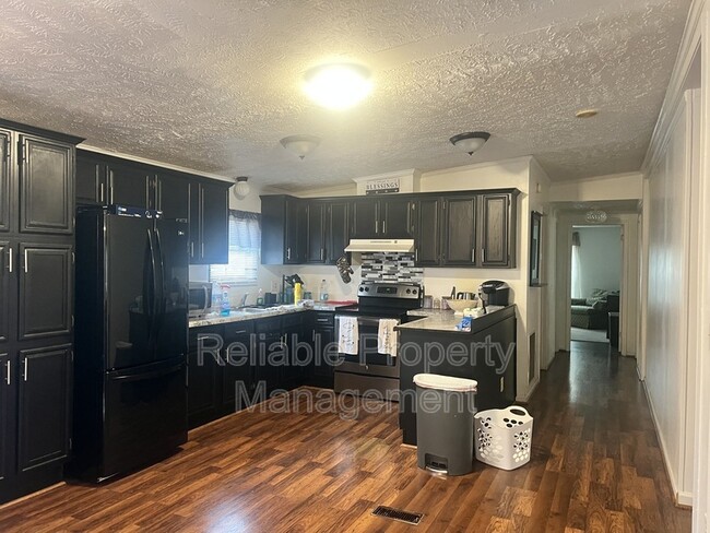 Building Photo - 4321 On Track Rd