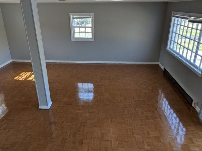 Building Photo - Spacious layout with loft style bedroom up...