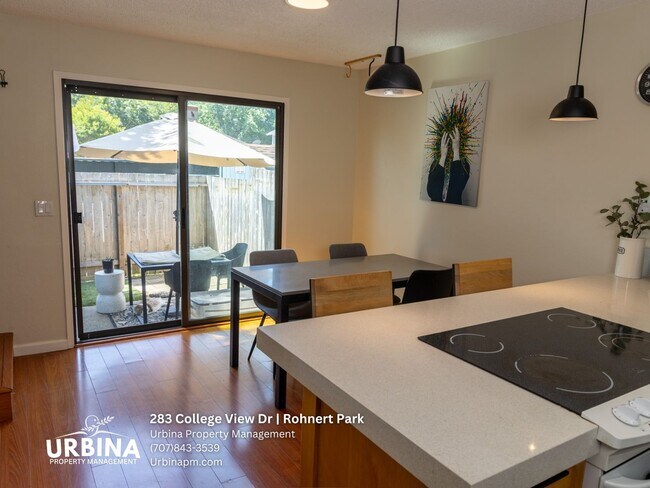 Building Photo - Two Bedroom Townhouse with Private Patio and Community Pool