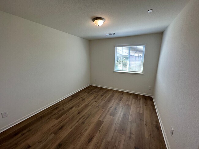 Building Photo - Stunning 4 Bedroom, 3 Bath Gated Community W/ Solar