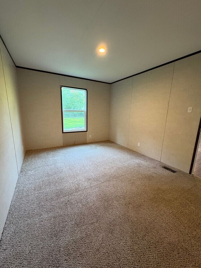 Building Photo - Huge 4 bedroom/2 bathroom double-wide in Peaceful Area of Keithville!