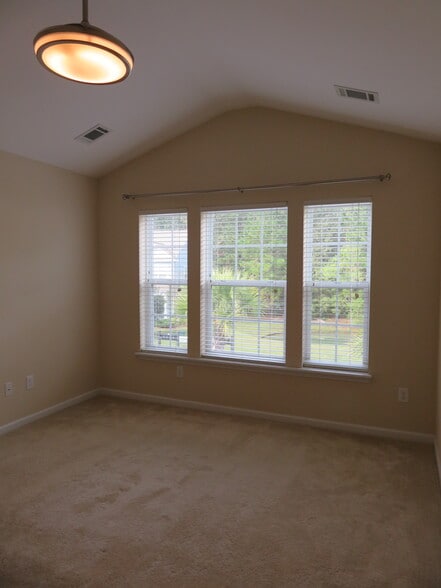 Master Bedroom w vaulted ceiling & carpet; ceiling fan w hidden blades, dimmable light. View to pond - 2496 Stadium Dr