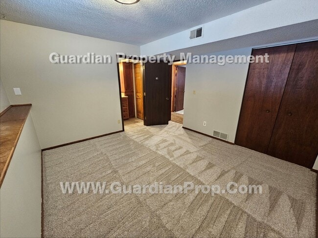 Building Photo - Updated Plymouth Single Family Home, 2 Car Garage, Large fenced Yard, Gas Fireplace
