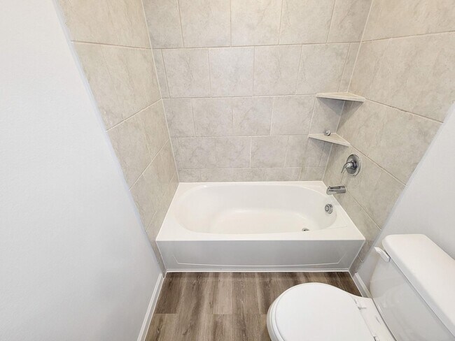 Building Photo - Welcome Home! Your never-lived-in sanctuary awaits your arrival. Have a large household? This 5-b...