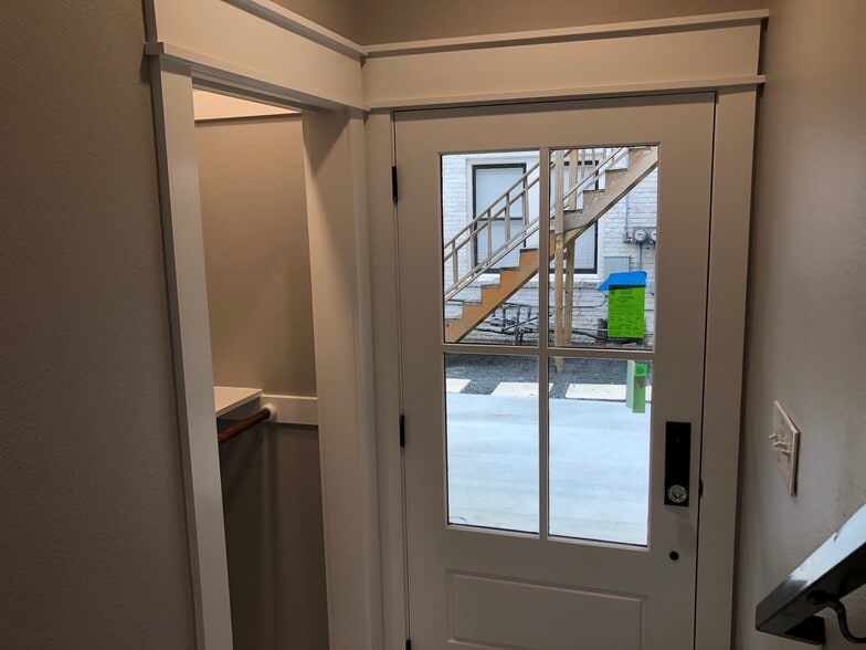 Storage/coat closet with pocket door near front entry - 1928 Harold St