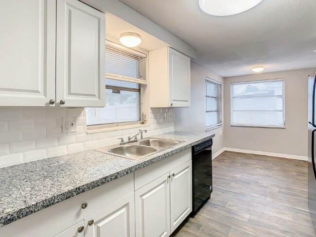 Building Photo - Check out this 3/1.5/1 1113 Sq. Ft. with UPDATED bathrooms and kitchen with GRANITE, LARGE backya...