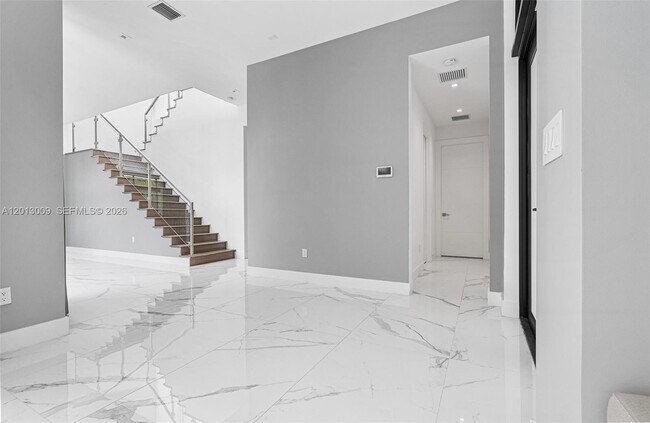 Building Photo - 16529 Botaniko Dr N