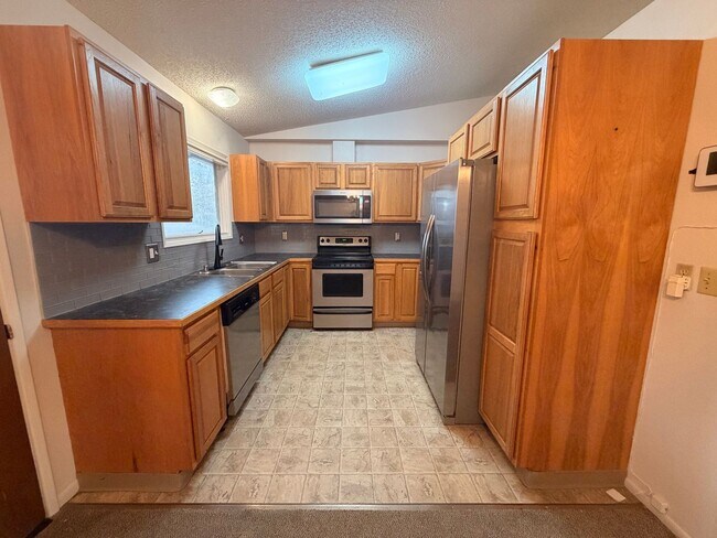 Building Photo - A beautiful and spacious (4) Bedroom home has what you need!
