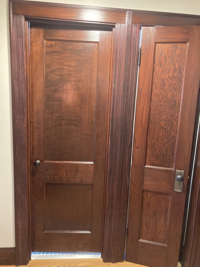 Refinished wood trim and doors - 5632 N Meade Ave