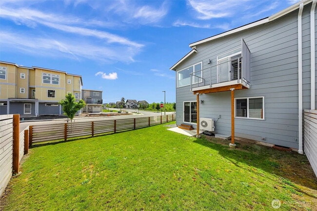 Building Photo - Modern 3-bedroom with Fully Fenced Yard in...