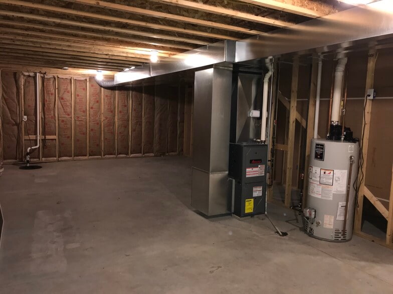 Half basement utilities and plenty of storage space. - 107 Scenic Drive