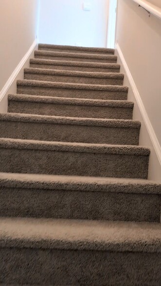 Stairs to second level - 265 Deerberry Dr