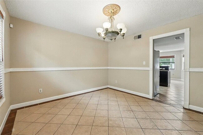 Building Photo - 7925 Tumblestone Dr