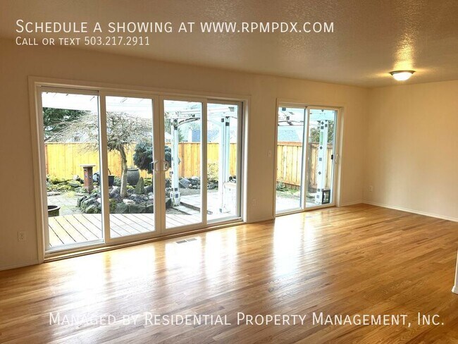 Building Photo - 6463 NW Wenmarie Dr