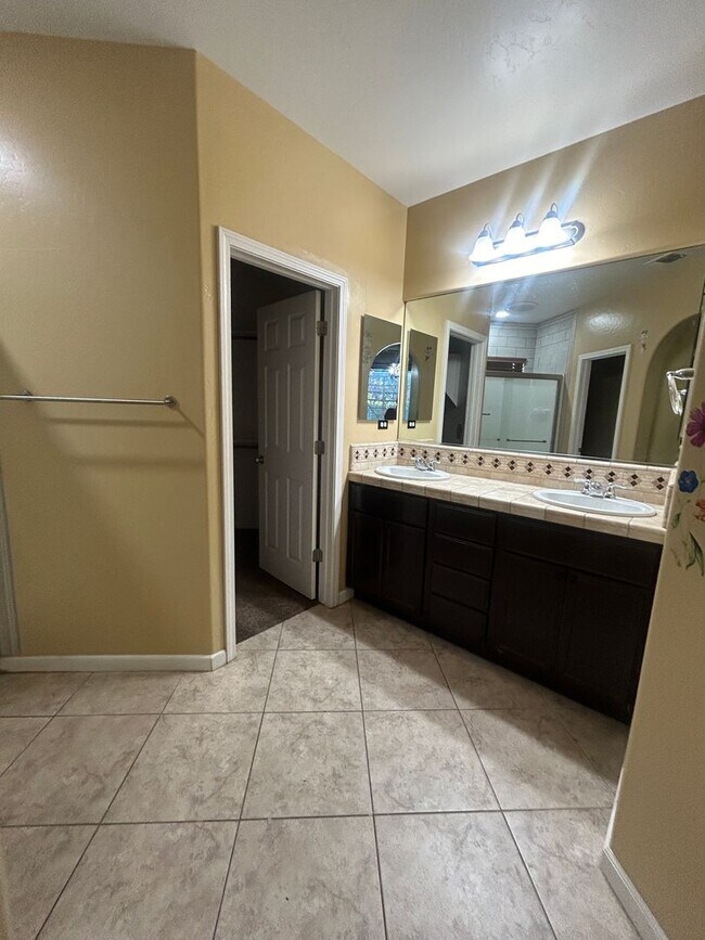 Building Photo - Step into your new residence, a charming s...