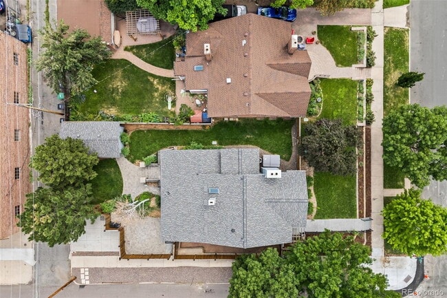 Building Photo - "Spacious 5-Bedroom Gem with Hardwood Floors & Cozy Fireplace in Denver's Heart!"