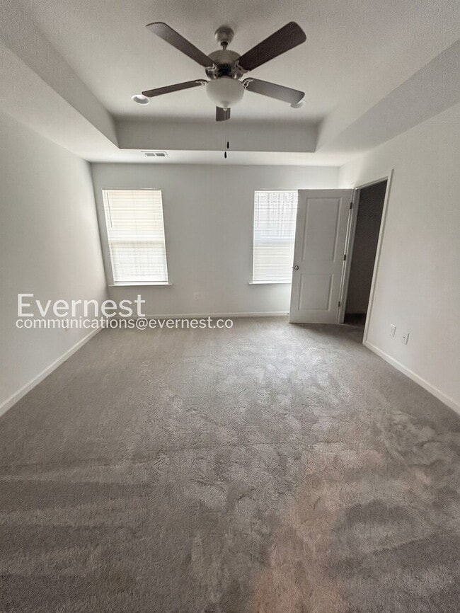 Building Photo - Spacious 3-BR Townhome with Private Patio & Garage / Pet Friendly / Vouchers Accepted / Coming Soon!