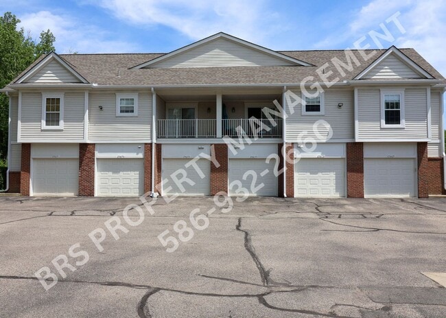 Building Photo - Move-In Ready 2BR Condo with Covered Garage in Harrison Township