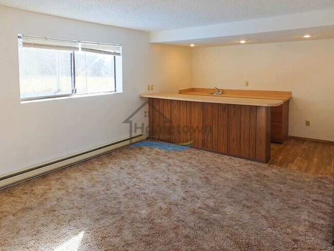 Building Photo - Spacious 4 Bedroom Home with Fenced Backyard & Garage