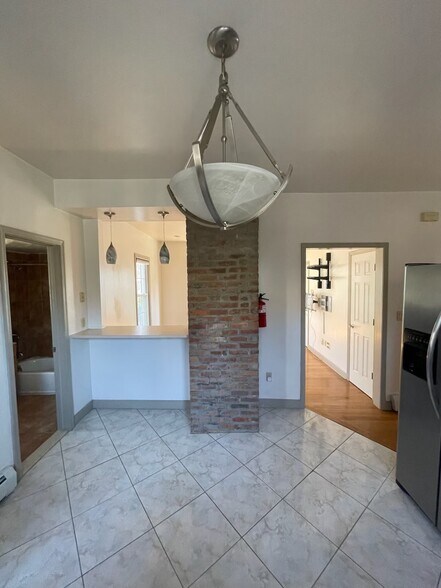 Kitchen Pass-through to Living Room - 49 E Passaic Ave