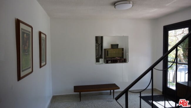 Building Photo - 1418 S Bentley Ave