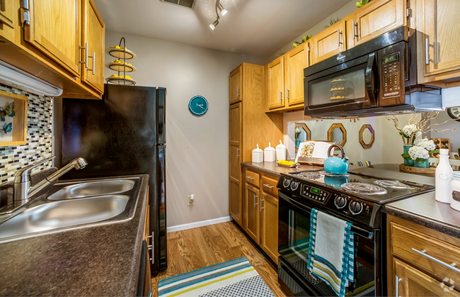 Galley Style Kitchen with Upgraded Appliances