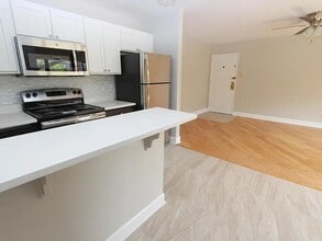 The Bentley - Renovated Kitchen - Apartments on Fifth