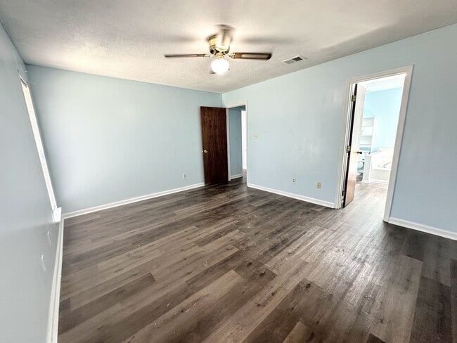 Building Photo - 3/2 No carpet & Fenced yard off Old Waynes...