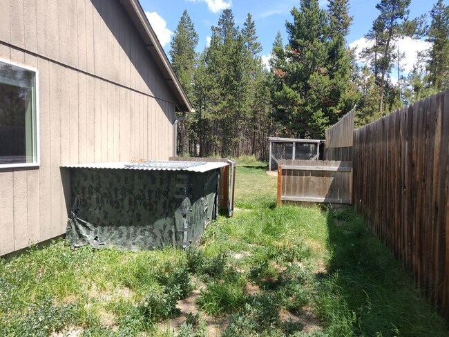 Building Photo - Charming 4-Bedroom Home on 1/2 Acre with a Fenced Backyard, Fully Insulated Double-Car Garage, in...