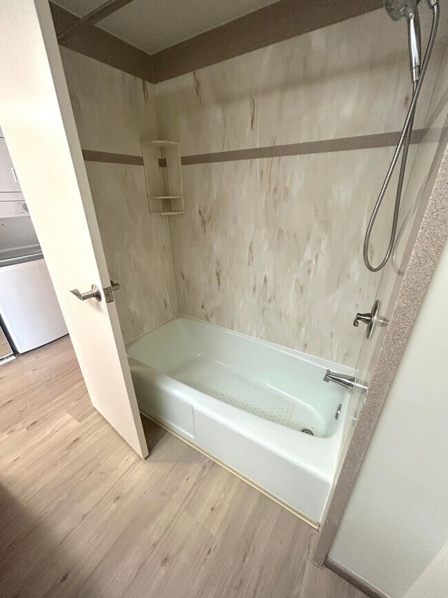 Building Photo - Available Now - High Floor Studio Apartmen...