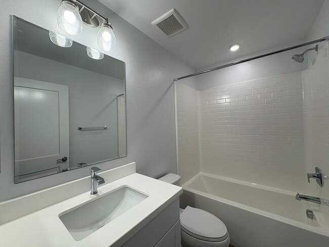 Building Photo - Modern Turn-Key Three-Story Townhome