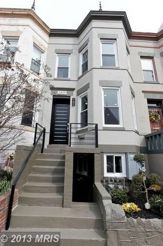 Front of row home. Main how encompasses top 2 floors. Includes access to the backyard and a private balcony. - 2207 Flagler Pl NW