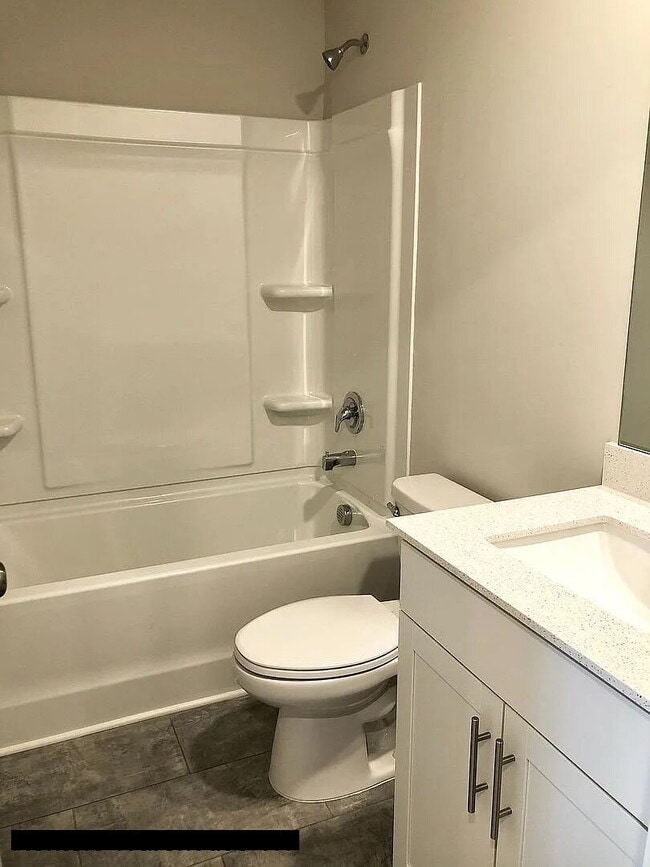 Building Photo - "Charming 3-Bed Townhouse with Granite Acc...