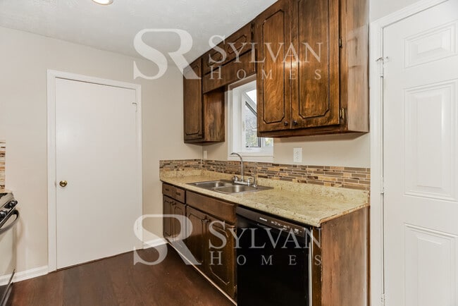 Building Photo - Turn the key. Enter. Smile. Repeat every day!