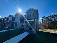 Building Photo - END UNIT Sunburst Villa Luxury Townhouse WITH BASEMENT