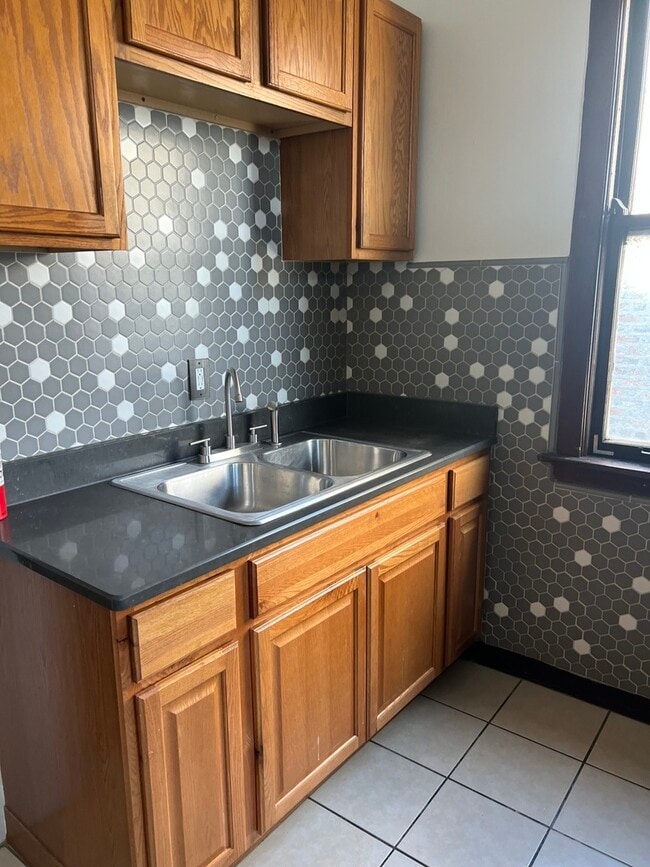 Building Photo - 8139 S Peoria St