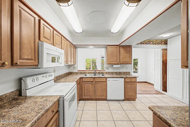 Building Photo - 9847 W Wrangler Dr