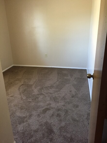 Bedroom. Freshly painted with new carpet. - 2418 S San Gully Rd