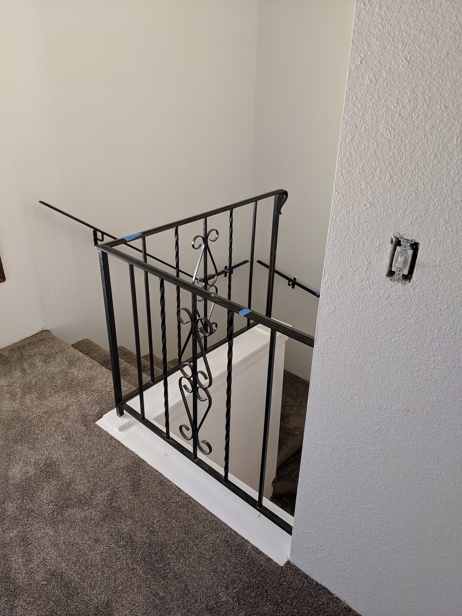 Stair railing at the landing - 2115 Pleasanton St