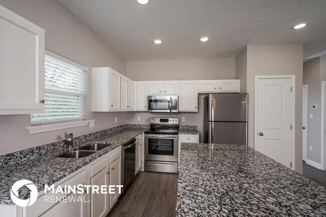Building Photo - 9135 River Trail Dr