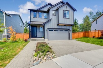 Building Photo - A true stunner in Tehaleh community!