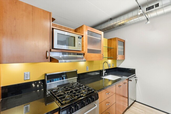 Building Photo - Modern Pearl District Condo – Studio with Alcove Bedroom + 1 Bath with City Views