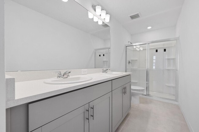 Building Photo - BEAUTIFUL 2 BEDROOM 2.5 BATHROOM TOWNHOME LOCATED IN THE HIGHLY SOUGHT AFTER SKY RANCH COMMUNITY!